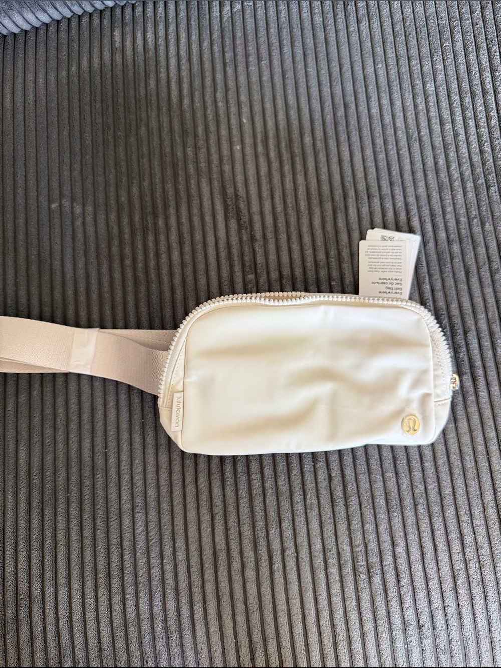 lululemon Everywhere Belt Bag in cream with gold hardware